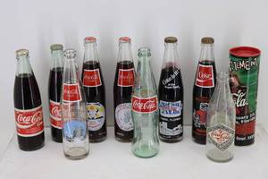 Coke Bottles including (2) Russian Bottles & (3) ND Bottles