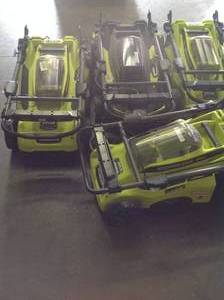 GAYLORD WITH 4 ELECTRIC BRUSHLESS LAWNMOWERS Various conditions Customer Returns SEE PICS