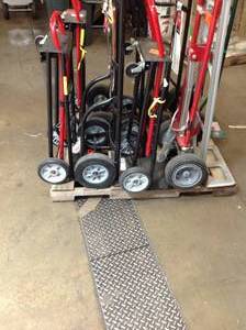 PALLET OF MILWAUKEE DOLLYS DIFFERENT SIZES MODELS AND CONDITIONS CUSTOMER RETURNS