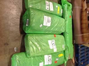 PALLET OF 4 RUGS NOT USED
