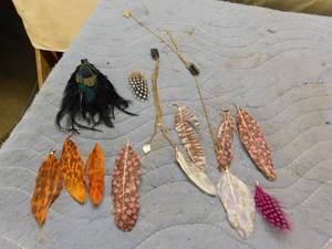 lot 177 image: Misc Hippy Feather Earings, Broach and Necklaces