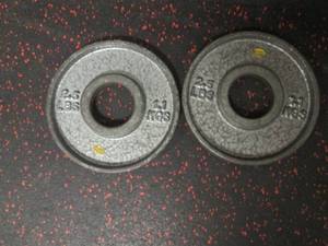lot 56 image: (2) 2.5# Weights...