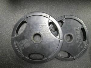 lot 63 image: (2) 25# Weights...