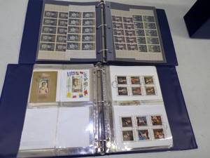Pair of Binders with Foreign Stamps