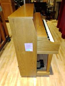 lot 214 image: Yamaha Piano and Bench with piano moving dolly.