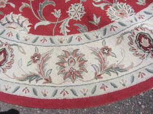 lot 10 image: Round Area Rug