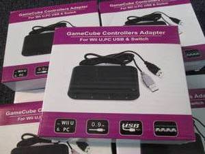 lot 121 image: 5 Game Cube Controller Adapters ZZ3...