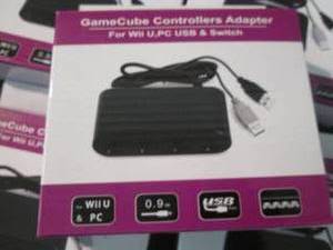 lot 129 image: 5 Game Cube Controller Adapters ZZ3...