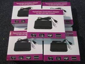 lot 136 image: 5 Game Cube Controller Adapters ZZ3...