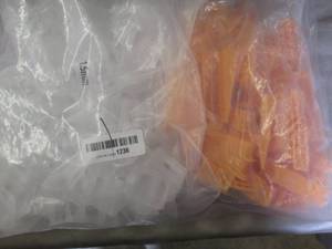 lot 209 image: Bag of Plastic Wedges etc...