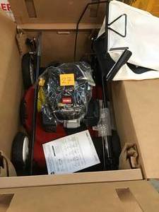lot 27 image: Toro 22 in. Kohler High Wheel Variable Speed Gas Walk Behind Self Propelled Lawn Mower not used