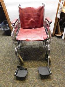 lot 7 image: Invacare Red Wheelchair