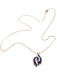 lot 12 image: Cluster Diamond and Deep Navy Blue Sapphire Wave Pendant.