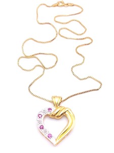 lot 14 image: Ruby and Diamond Heart Shaped Pendant