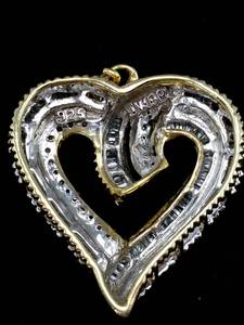 lot 23A image: A Diamond Heart Shaped Pendant