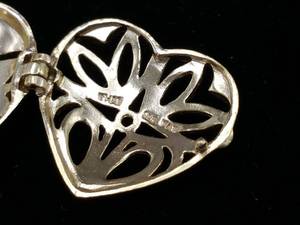 lot 29 image: Silver and Diamond Heart Shaped Locket Necklace