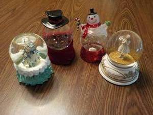 3 Musical Snow Globes and 1 Regular...