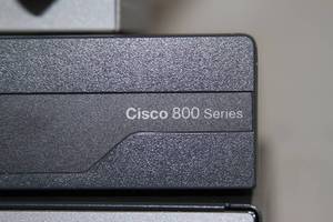 lot 104 image: Lot of Cisco 800 Series Integrated Services Routers & Wireless Network Security Firewall Units