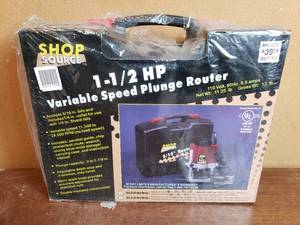 lot 71 image: Shop Source 1 12 HP Plunge Router