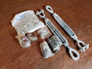 lot 101 image: 2 Turn Buckles, 12 Pipe Fittings, Bag of Nuts