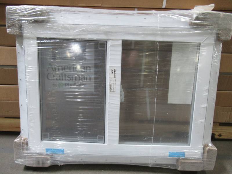 lot 626 image: American Craftsman 29 34 x 21 12 x 2 34 Slider Window (Slides Left from Inside) in White Vinyl.