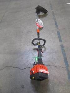 lot 11 image: Remington 8 in. 25cc 2-Cycle Gas Trimmer RM2599