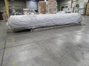 lot 430 image: Cut Roll of Speckled Beige Carpet, Approximately 12 X 100 With about a 14 of Pile and Poly Backing