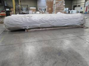 lot 432 image: Cut Roll of Speckled Brown Carpet, Approximately 12 X 100 With about a 14 of Pile and Poly Backing.