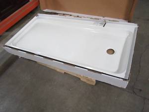 lot 603 image: Bootz Industries ShowerCast 60 in. x 30 in. Single Threshold Shower Pan in White with Left Drain 010-1001-00 - Slight Porcelain Chip LH Top of Threshold