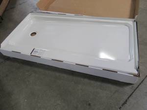 lot 604 image: Bootz Industries ShowerCast 60 in. x 30 in. Single Threshold Shower Pan in White with Left Drain 010-1001-00 - Slight Porcelain Chip LH Top of Threshold.