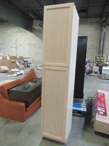 lot 437 image: Hampton Bay Easthaven Assembled 18 x 84 x 24.63 in. PantryUtility Cabinet in Unfinished German Beech - Slight Crack RH Top Corner.