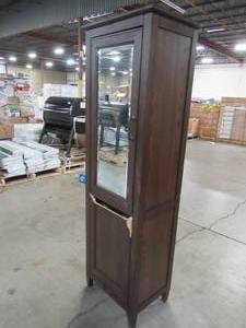 lot 439 image: Home Decorators Collection Walden 23 in. W x 67-12 in. H x 15 in. D Bathroom Linen and Hamper Storage Cabinet in Dark Stained Solid Wood. - Broken Hamper.