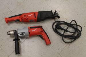 lot 13 image: Milwaukee Electric Sawzale And Milwaukee Electric Hammer Drill In One Lot