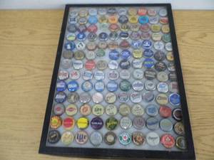 lot 86 image: Display of Bottle Caps