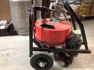 The Works 12 in. x 50 ft. Power Feed Drain Cleaner Machine in good condition missing the attachment review pictures