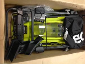 Ryobi 20 in 40 volt Brushless Lithium Cordless Walk Behind Lawn Mower whit 5 ah battery and charger in working conditions