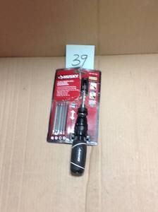 lot 39 image: Husky 12-in-1 Quick-load Ratcheting Screwdriver with 6 Driver Blades in Handle  in good condition