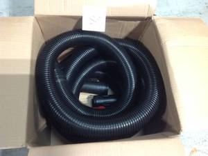 lot 85 image: RIDGID 2-12 in. x 20 ft. Tug-A-Long Vacuum Hose for RIDGID Wet Dry Vacsin good conditionin good condition