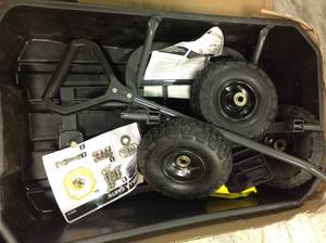 lot 112 image: GORIILA CARTS 4 cu. ft. Poly Garden Dump Cart (NOT USED)