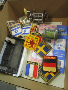 lot 765 image: REELS, LAKE MAPS, INTERNATIONAL PATCHES AND MORE