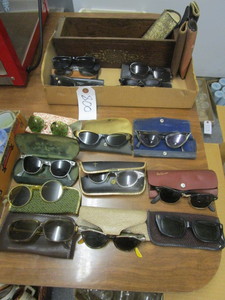 lot 800 image: VINTAGE SUNGLASSES AND A SEWING MACHINE DRAWER