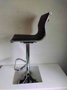 lot 9 image: Single Black Faux Leather Barstool