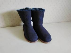 lot 34 image: Monogrammed UGG Bailey Bow II Boots (Size 8)