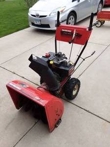 lot 62 image: Yard Machines 8 HP 24 Inch Snow Blower