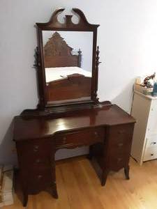 lot 94 image: VanityDressing Table With Mirror. Has 7 Drawers 46x18x70