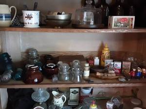 lot 176 image: Collectibles Telephone Insulators, Spice Tins, Cigar Box (Middle Shelf)