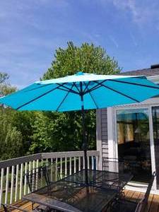 lot 2 image: Outdoor Patio Set with Umbrella