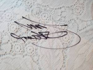 lot 9 image: Autographed TONY STEWART Race Used Window Fitting