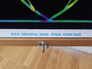 lot 183 image: Black Light Poster GRATEFUL DEAD STEAL YOUR FACE