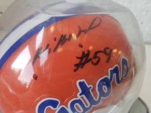 lot 130 image: Autographed Mini Helmet Florida Gators MIKE NATTIEL SEC Champion